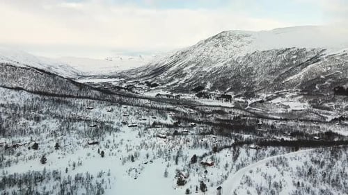 Cabins At Snowy Mountain During Winter In Norway. - aerial