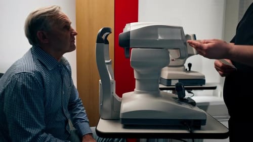 in an Ophthalmology Clinic Obese Doctor Tells the Results of Eye Diagnostics to a Patient