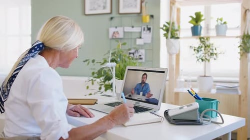 Senior Woman Telemedicine Call With Male Doctor