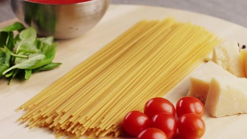 Colorful Pattern of Italian Pasta Tomatoes Sauce Penne Pasta Ingredients Olive Oil Spices and Basil