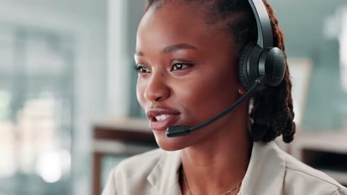 Black woman, consultant and talking with headset at call center for communication