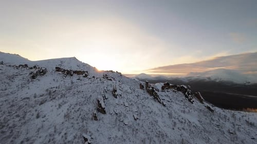 Snowy Mountains Landscape at Golden Hour Aerial