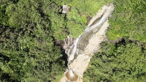 Waterfall on a rock in the mountain