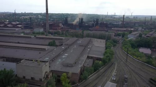 Smoke From The Plant Pipes Above The City Buildings 15