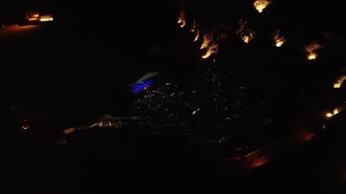 Aerial View of Concert Crowd at Night