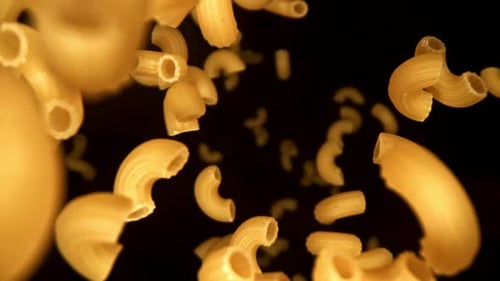 Elbow Macaroni Falling on Black Background, Food Concept