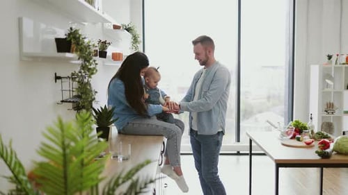 Happy Family Play Time in Bright Kitchen