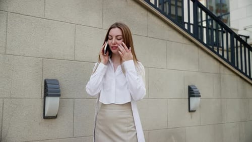 Young Businesswoman on Urban Walk