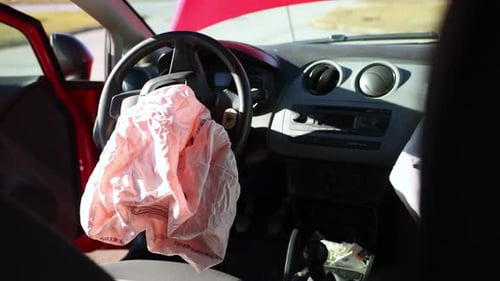 Deployed Airbags After Head-on Collision. - reveal shot