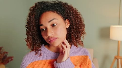 Intimate Portrait of a Woman with Curly Hair