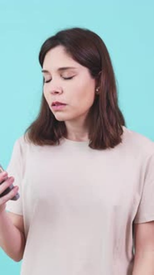 Woman Confused by Content on Phone