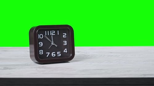 Analog Clock on Wooden Table Show Time on Green Screen