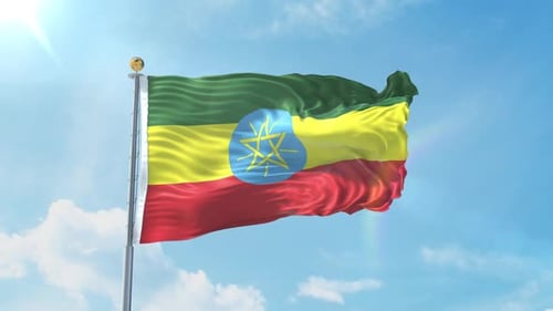Ethiopian Flag Waving in Blue Sky with Sun Glare
