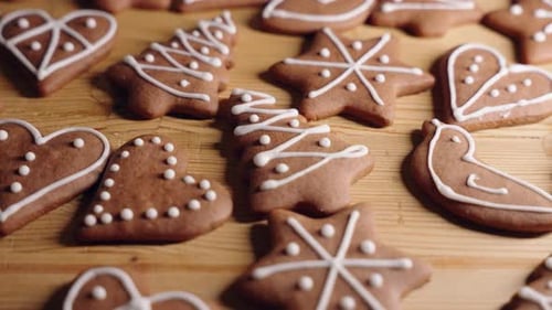 Decorating Gingerbread Cookies for Christmas, Closeup Shot Making handmade festive new year sweets a