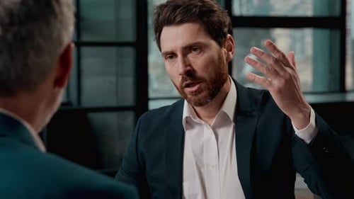 Angry Aggressive Caucasian Businessman Arguing with Colleague in Office Conflict Displeased Stressed