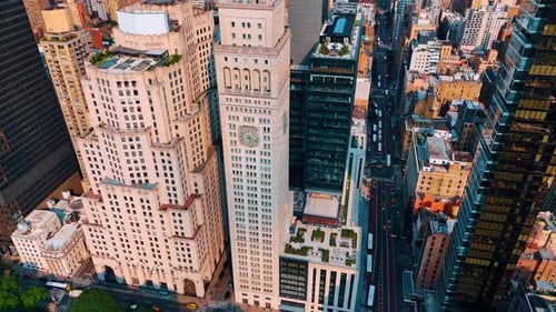 Beautiful tower with a round clock on the façade. Architecture of modern New York, USA.