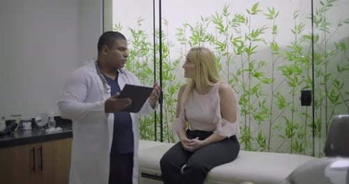 Doctor Discussing Results with Patient in Modern Office