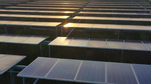 Aerial view of solar panels stand in a row landscape electrical power