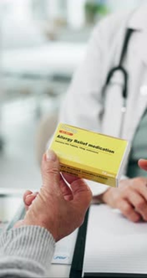 Hands, doctor and patient with pills, box and explain for allergy relief, retirement and advice
