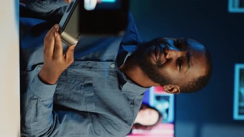 Man Vlogging with Mobile Phone at Home