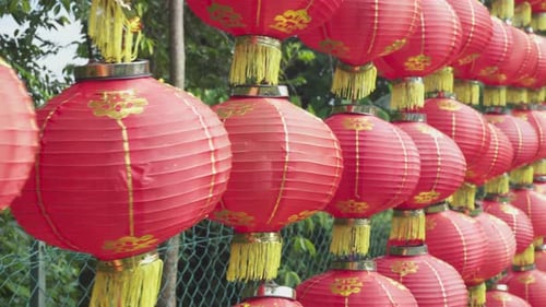 Amazing red outdoor wall. View of traditional Chinese lanterns