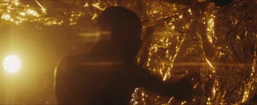 Silhouette of a Boxer Punching a Heavy Bag