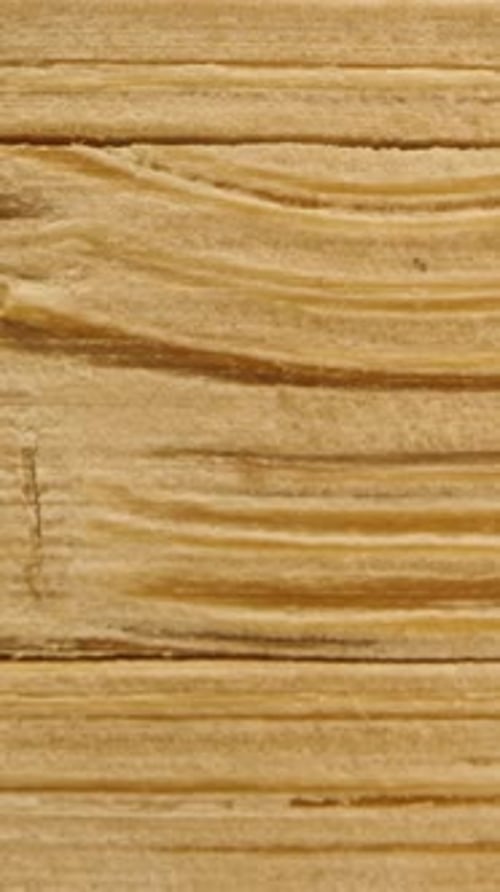 Vertical video. Wooden fibers on a board, knots. Macro slider, dolly.