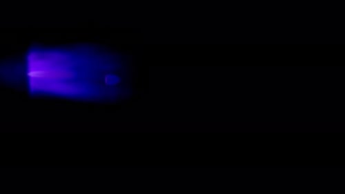 Radium Collection: Vibrant blue lens flare effect dropping gently from the left