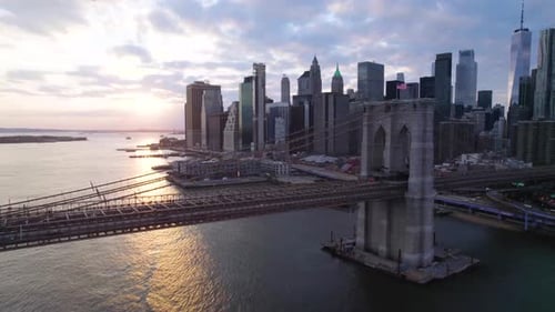 Side panning clip of Brooklyn Bridge, NY Harbor, and Lower Manhattan