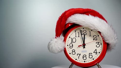 Christmas Countdown: Clock with Santa Hat Ticking