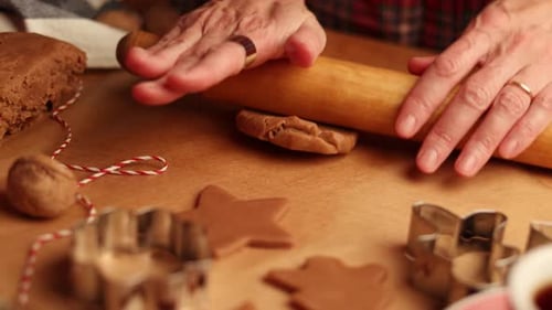 Rolling Brown Cookie Dough on Table