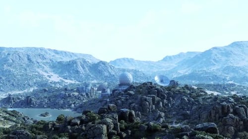 Military Base Situated in Mountainous Terrain with Monitoring Equipment Visible