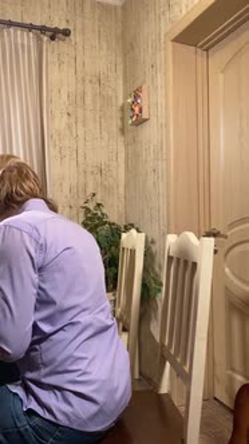 Father and Son Playing Keyboard Together at Home