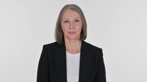 Senior Businesswoman with Thumbs Up on White Background