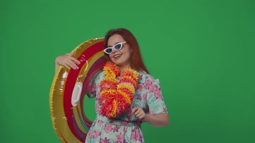 Woman Dances with Inflatable Tube on Green Screen