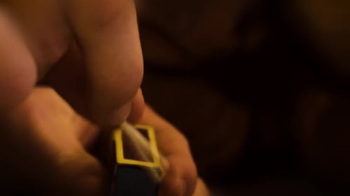 Close Up of Match Lighting in Dark