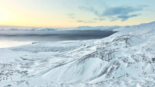 Snowy Mountain Range Aerial View Nature Landscape in Iceland Snow Covered Sharp Mountain Peaks
