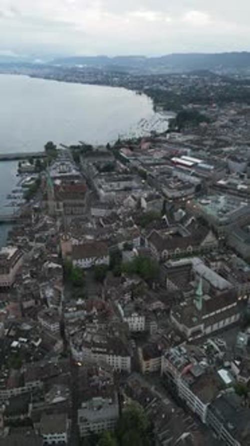 Aerial cityscape flythrough video of Zurich and River Limmat, Switzerland