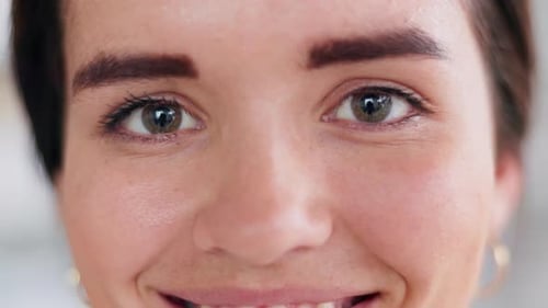Woman Smiling in Extreme Close-Up Shot