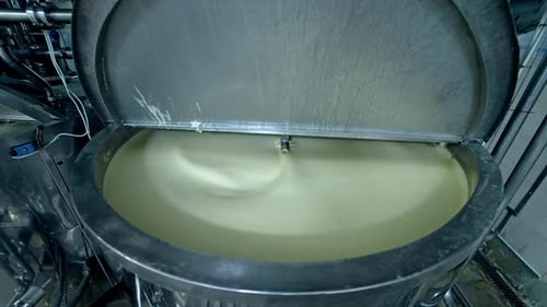 Production of butter at dairy plant. Butter production at dairy food industrial line