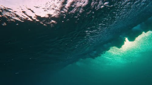 Underwater View of the Ocean Wave Breaking Over the Shore in the Maldives