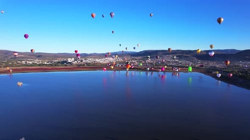 Traveling to hot air balloons over the lake