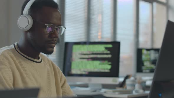 African American Software Engineer Working on Computer, Technology ...