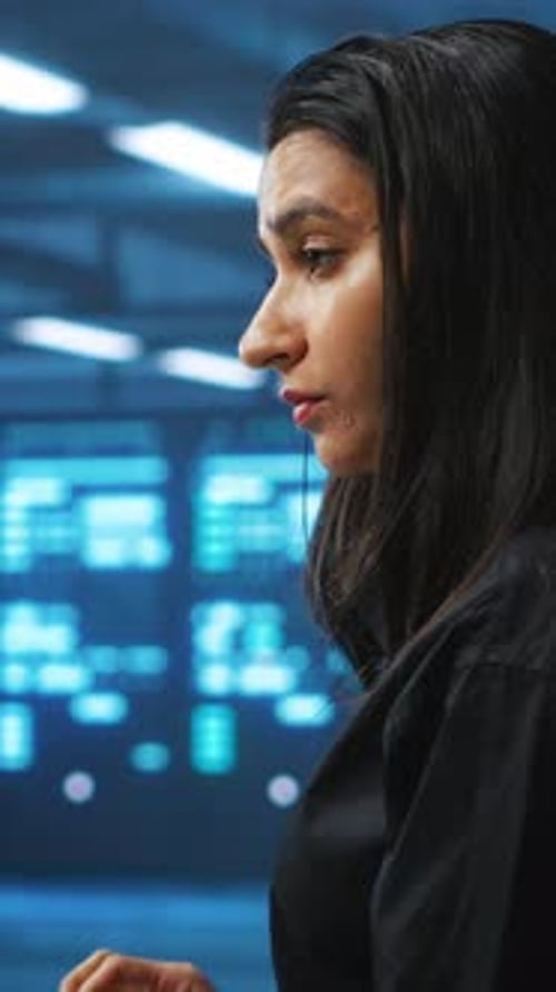 Thoughtful Woman Working in a Futuristic Tech Workplace