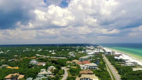 A wonderful aerial scenery of the city near the beach on a bright sunny day