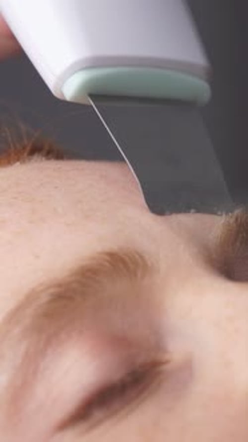 Facial Treatment with Skincare Device Close Up