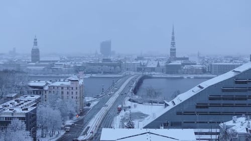 Winter Morning in Riga - Snow-Covered Cityscape and Iconic Skyline, Baltic State