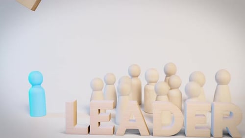 Leadership Concept with Wooden Figures and Arrow