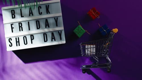 Black Friday Shop Day on Flat Layer Purple Background