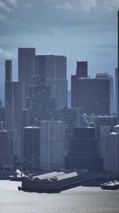 City Skyline Across Vast Water